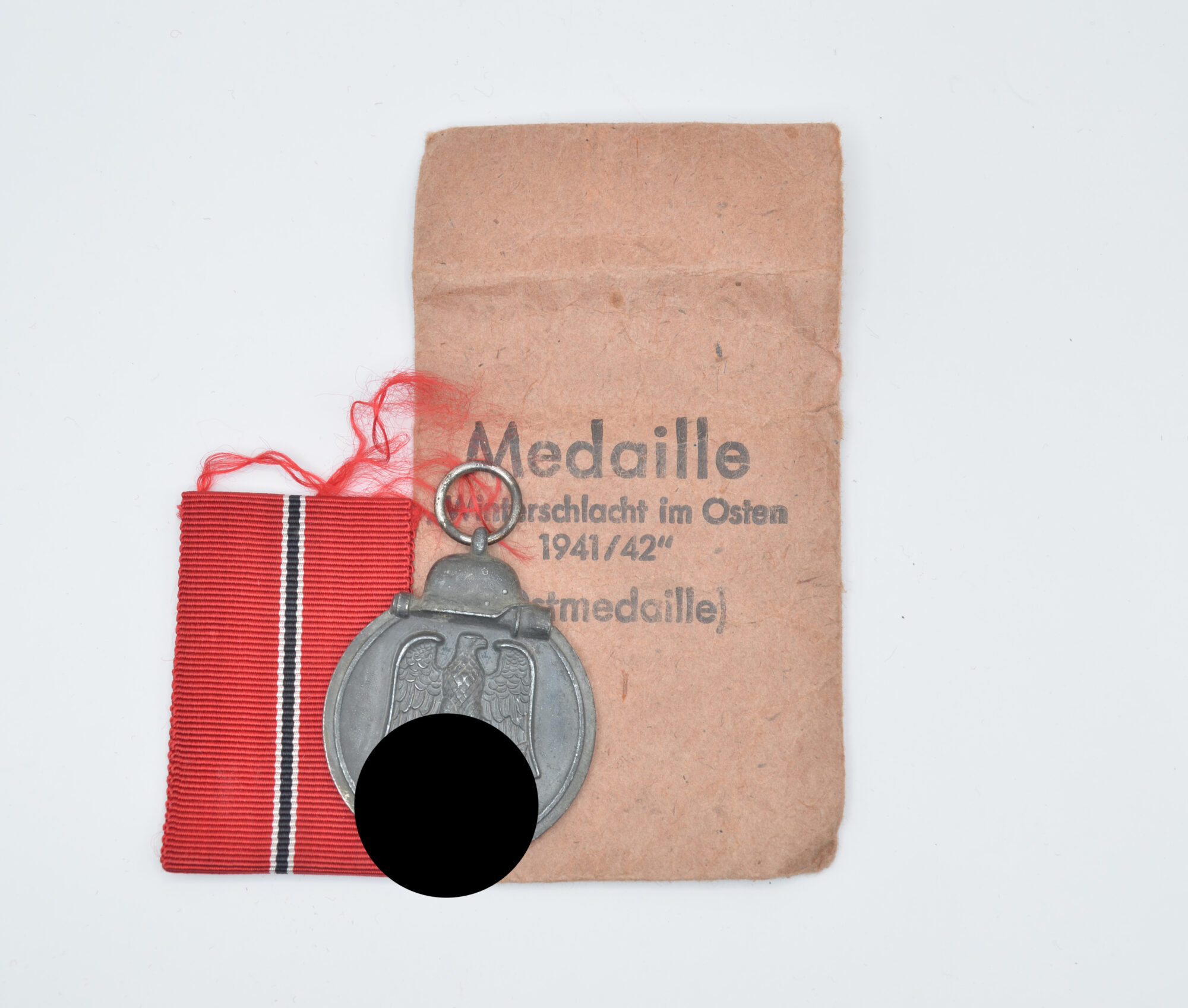 Medaille Winterschlacht im Osten (Ostmedaille) mit Verleihungstüte