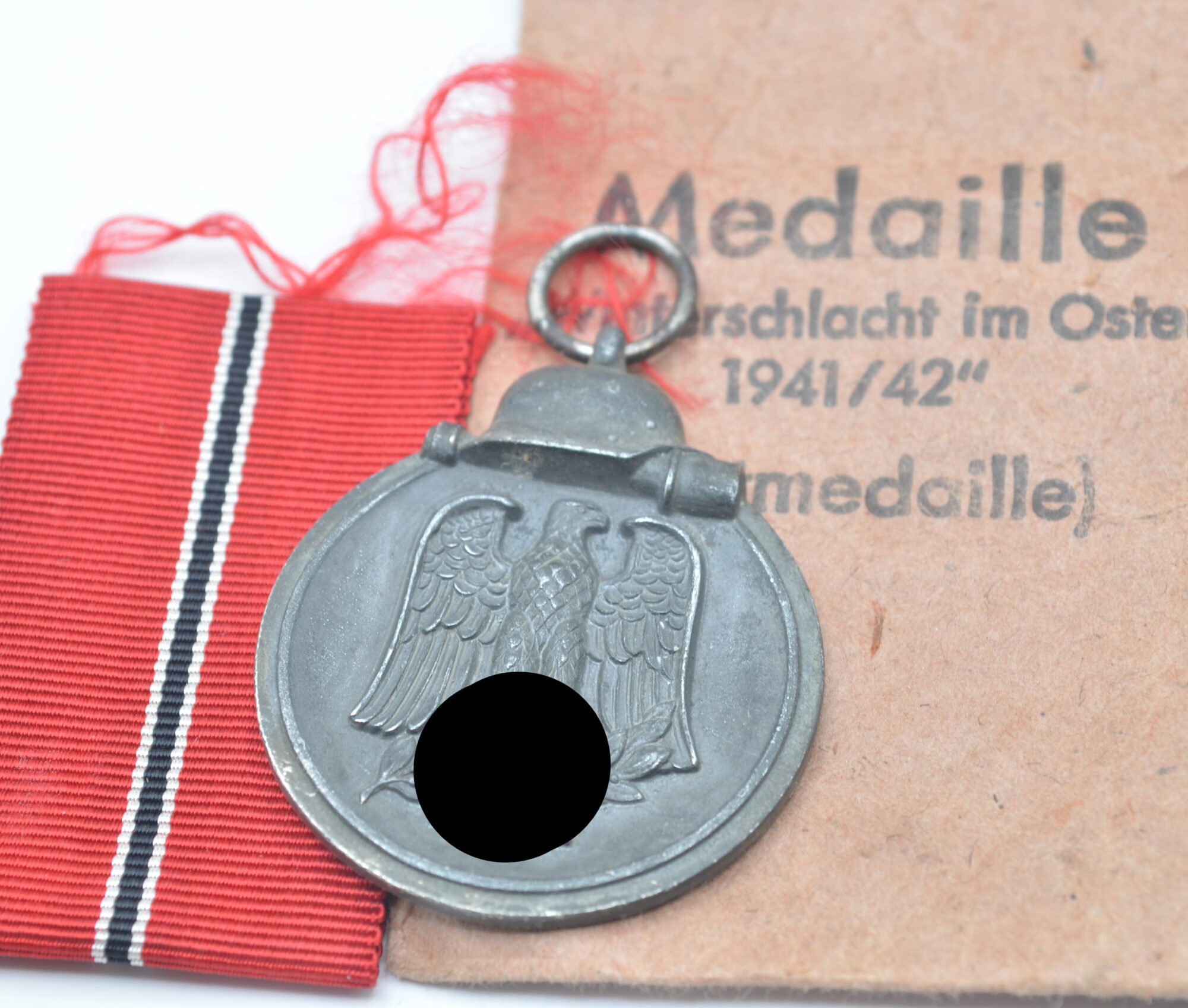 Medaille Winterschlacht im Osten (Ostmedaille) mit Verleihungstüte